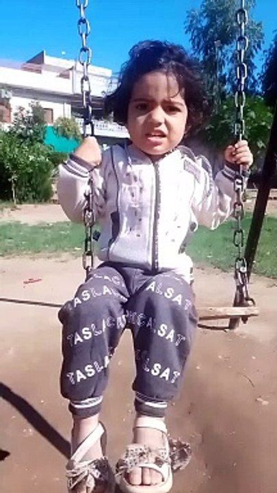 "Cute Girl Enjoying and Having Fun on a Swing | Happy Moments" Write YouTube description