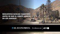 Rescatistas buscan cadáveres antes de que el viento arrecie en Los Ángeles