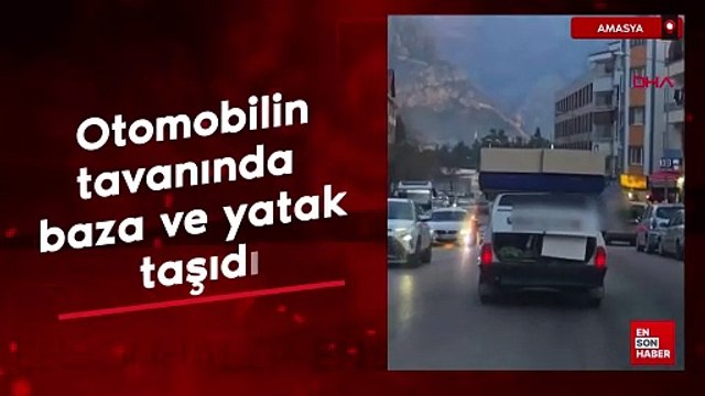 Amasya'da otomobilin tavanında çift kişilik baza ve yatak taşındı