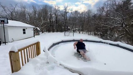 Man Lands Hard on Frozen Pool