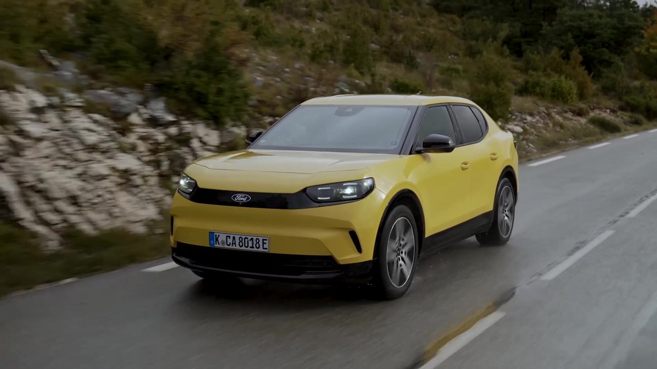 The new Ford all-electric Capri in Vivid Yellow...