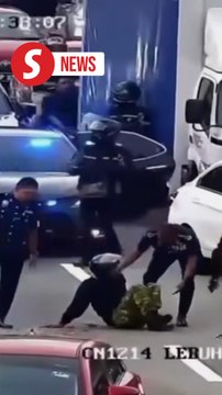 Top cop to the aid of injured motorcyclist