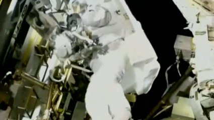 Nasa astronaut trapped in space ventures outside for first time in months