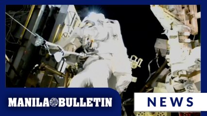 NASA's stuck astronaut steps out on a spacewalk after 7 months in orbit