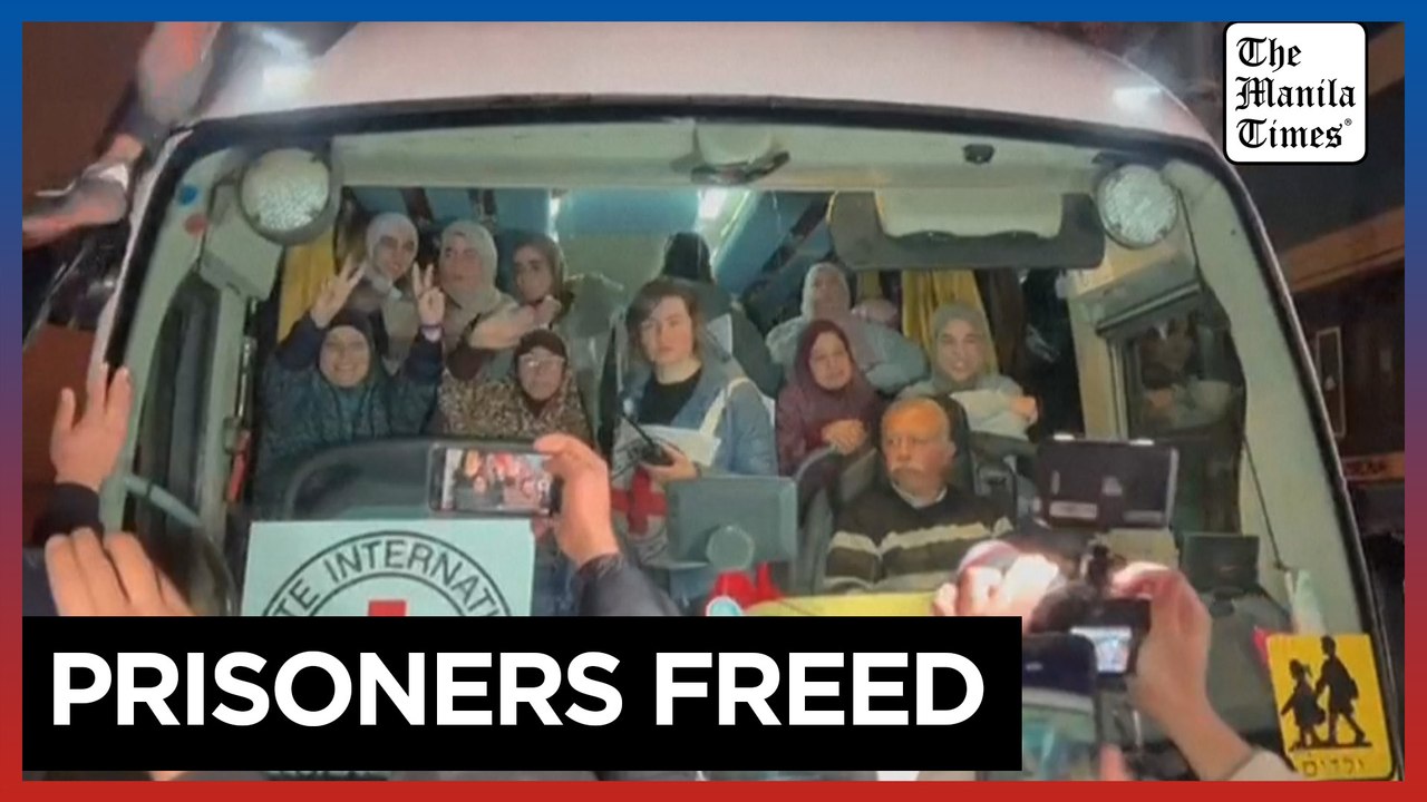 Crowds cheer as freed Palestinian prisoners arrive in West Bank town
