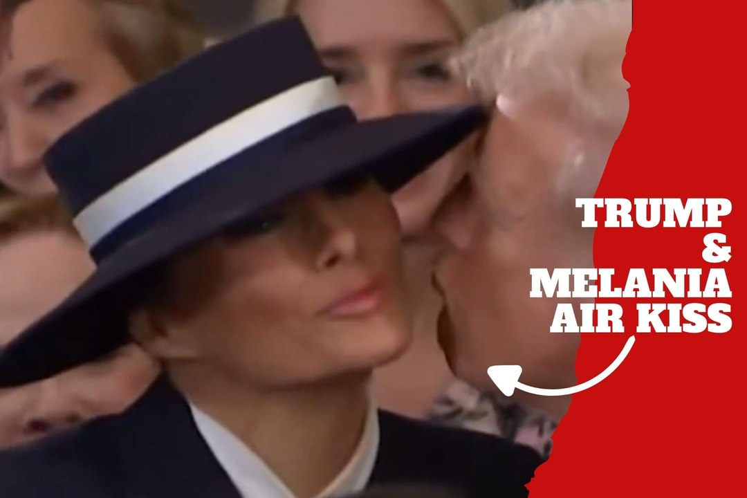 Donald Trump and Melania Trump air kiss during Inauguration Day