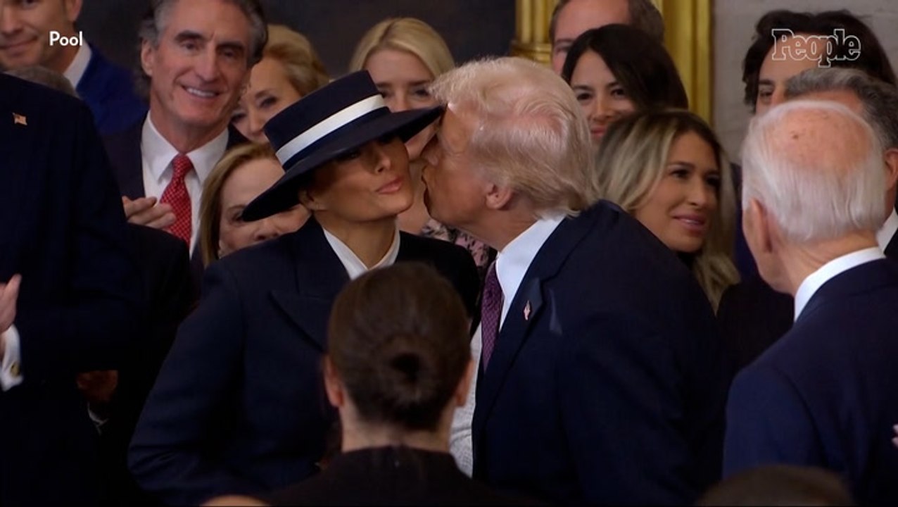 Donald and Melania Trump Share an Air Kiss on Inaugural Stage Before His Swearing-In