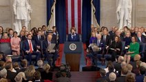 Joe Biden makes sign of the cross during Donald Trump's inauguration ceremony