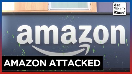 Climate activists smear paint on Amazon House in Davos