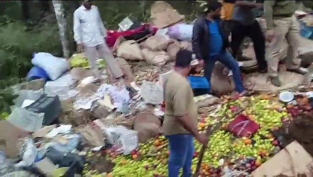 9 people killed as lorry carrying fruits and vegetables falls into ditch at Arabail Ghat
