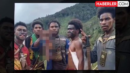 Silahlı adamların insan vücudu parçalarıyla poz vermeleri ülkeyi ayağa kaldırdı
