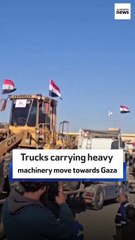 Trucks carrying heavy machinery move towards Gaza
