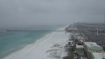 Snow falls in Pensacola beach, Florida