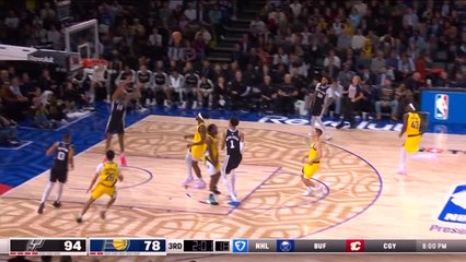 Wembanyama puts on a huge block before setting up an alley-oop