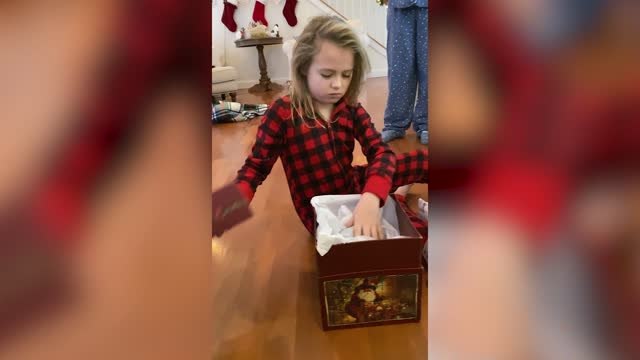 Girl Opens Toy Puppy Gift Before Real Puppy Walks Into Room | Happily TV