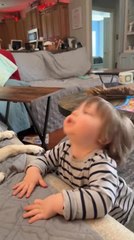 Dog and Little Kid Howl Together, Creating Playful Sound