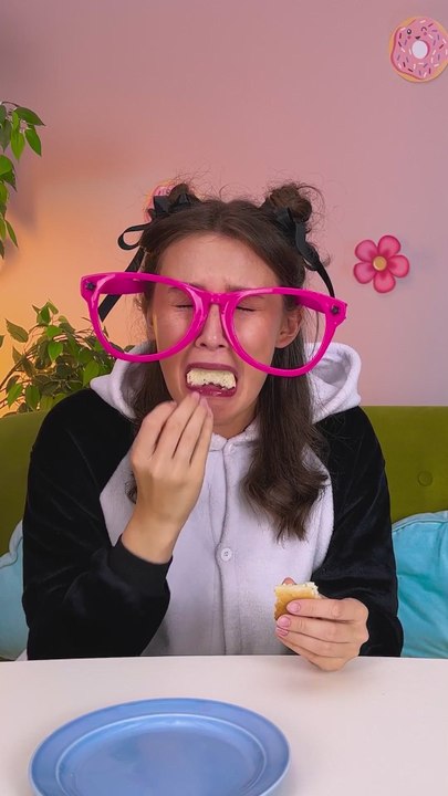 What is she even doing?! 🤔🌭