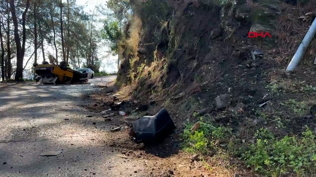 Kayalıklara çarpan otomobil takla attı