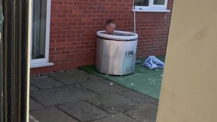 Man takes an ice bath in the middle of January and proves the cold doesn't bother him, anyway