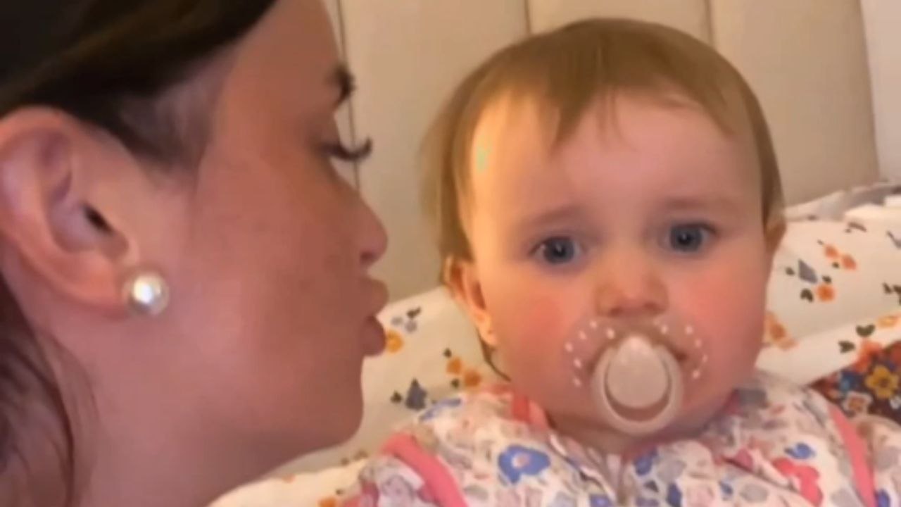 Baby responds to Mom's wish for a kissy with a perfectly-timed eye-roll