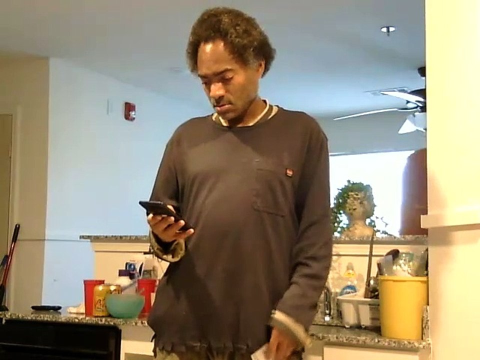 Showing people how to upload prepaid minutes on a AT&T phone.