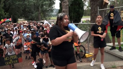 Around a thousand march in Invasion Day rally in Canberra, protesting at Parliament House