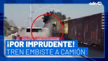 ¡Imprudente! Tren embiste a camión de pasajeros que invadió las vías, en Jalisco