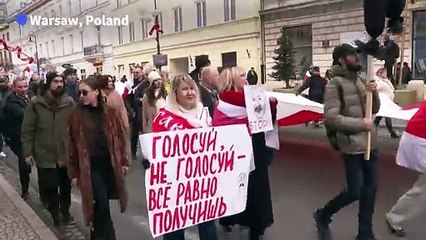 Exiled Belarusian opposition leader marches in Poland as Belarus holds presidential election