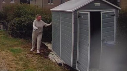 Woman battles 80 mph winds to save shed from destruction... but to no avail!