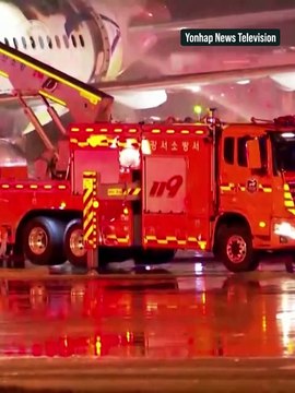 Air Busan plane catches fire at airport in South Korea