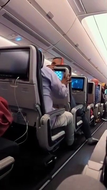 'Two people arguing over the reclined seat on the plane. The passenger behind was upset because the guest in front of him recl...s seat back, so he shook his seat forcefully starting a whole commotion. The flight attendant then told him.