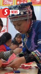 Chinese people embrace snakes as new zodiac symbol