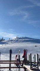 Beginner skier nails the slope but falls hilariously right in front of bar