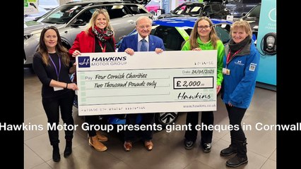 Hawkins Motor Group presents giant cheques in Cornwall