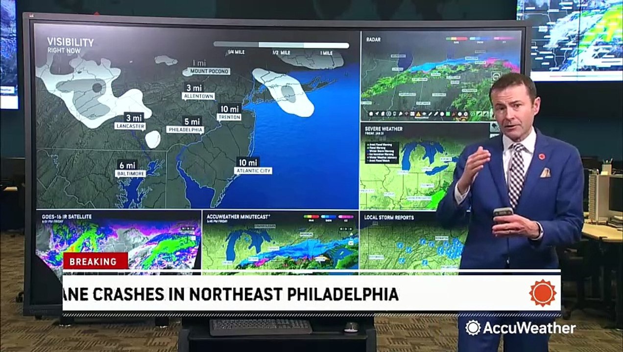 Fire engulfs part of Philadelphia after plane c...