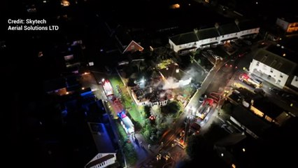 Fire crews battle house blaze