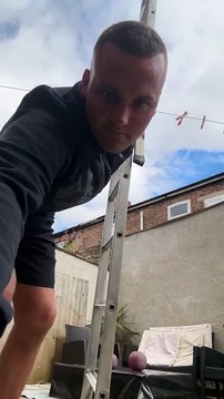 Daredevil balances ladder on chin perfectly without losing balance