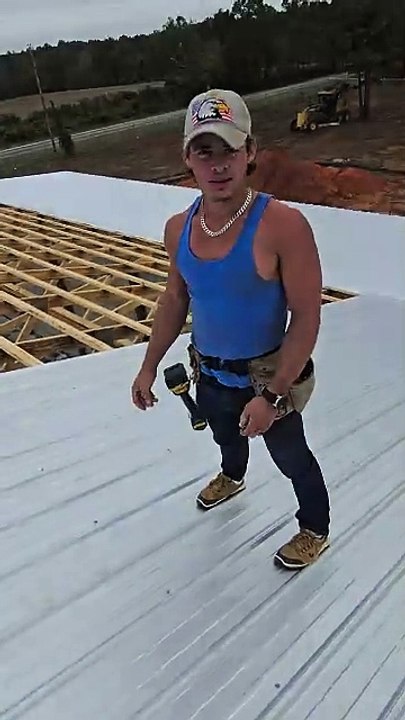 Man Slips and Slides off Roof While Demonstrating Slip-Resistant Roofing Shoes