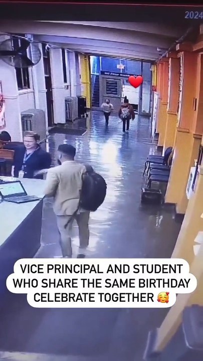 The vice principal and a student who share the same birthday celebrate together.