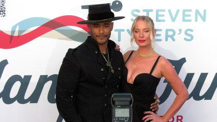 Aryeh-Or Katz and Katarina Benzova on the red carpet at Steven Tyler’s 6th annual Grammy Awards viewing party
