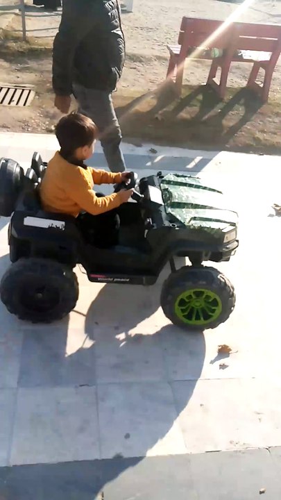 Kid driving a car