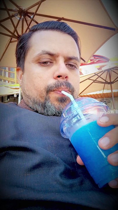 Drinking blueberry slush