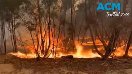 Crews battle to protect properties as fires rage