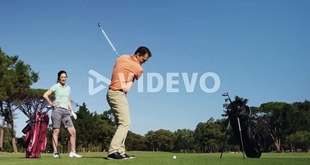 Golfers playing golf