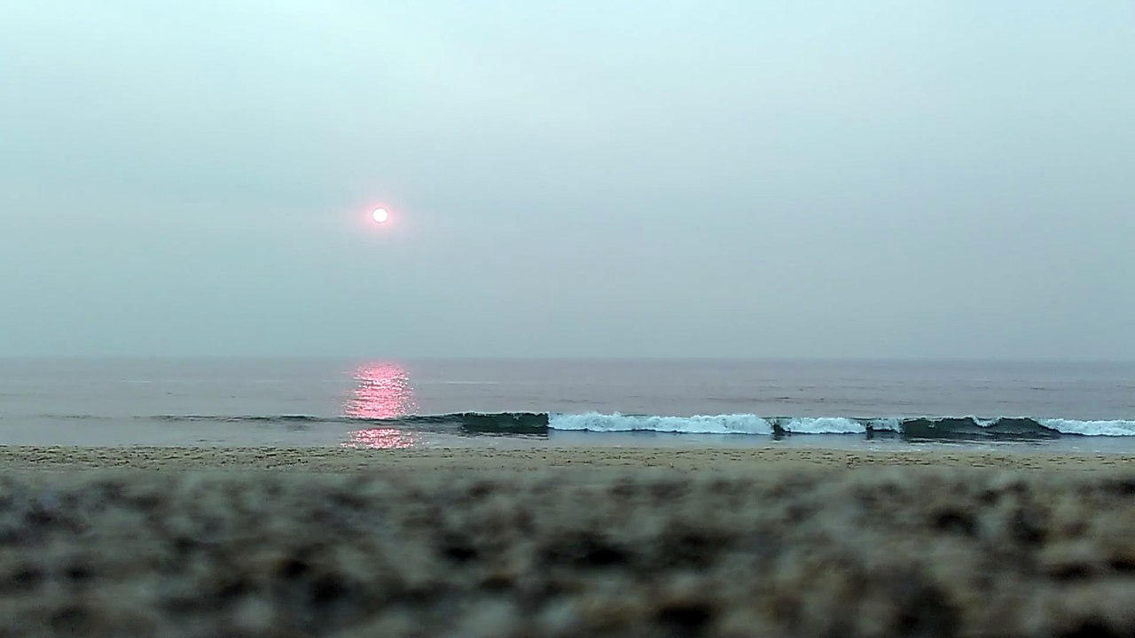 Red sun over the Atlantic ocean in Portugal