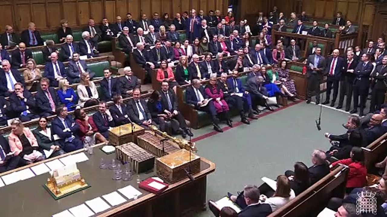 Nigel Farage is heckled as he asks Keir Starmer a question during PMQs