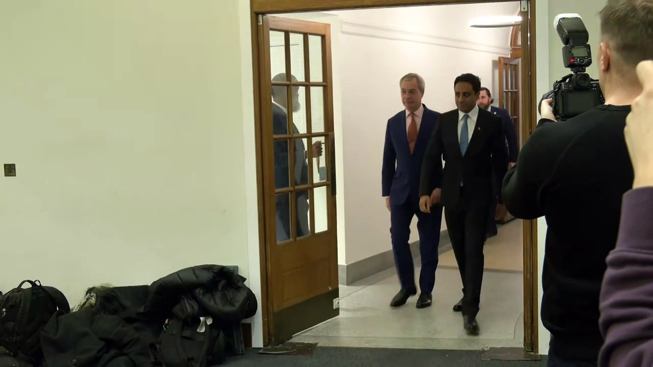 Nigel Farage arrives at Reform UK press conference