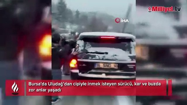 Uludağ'da hareketli anlar...Buzlu yolda kayan cipi durdurmak için peşinden koştular