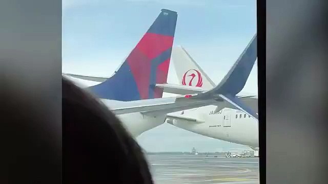 Japan Airlines plane slices through tail of Delta aircraft in shocking Seattle airport collision