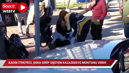 Kadın itfaiyeci, şoka girip üşüyen kazazedeye montunu verdi